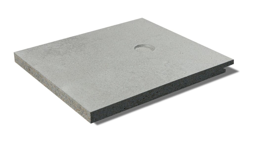 A single square piece of gray concrete slab with a smooth surface and a small circular indentation near the center. The slab appears to be of moderate thickness and has clean, straight edges. The background is white and minimalistic.