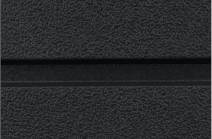 Close-up of a textured, dark gray surface with a black horizontal groove running across the middle. The surface features a slightly rough, pebbled pattern.